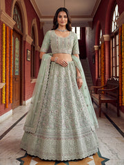Elegant Mint Green Bridal Net Lehenga Choli with Zari Embroidery & Net Dupatta