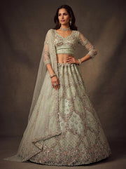 Luxury Mint Green Net Bridal Lehenga Choli with Zari Embroidery & Zircon Diamond Work