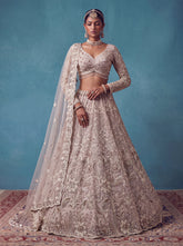 White Heavy Embroidered Net Bridal Lehenga Choli with Designer Lace Dupatta