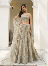 Symbolic Looking Wedding Wear Ivory Colour Lehenga Choli