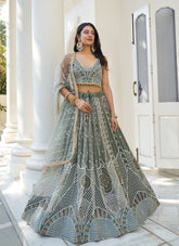 Figurative Looking Partywear Dusty Green Colour Lehenga Choli