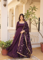 Outstanding looking partywear gown in purple colour