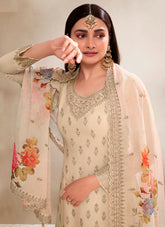 Cream colour salwar suit looking upscale