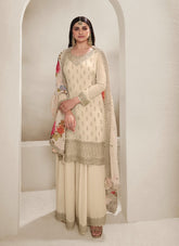 Cream colour salwar suit looking upscale