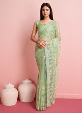 Trendy looking saree in pista colour