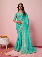 Stunning looking sea green georgette saree