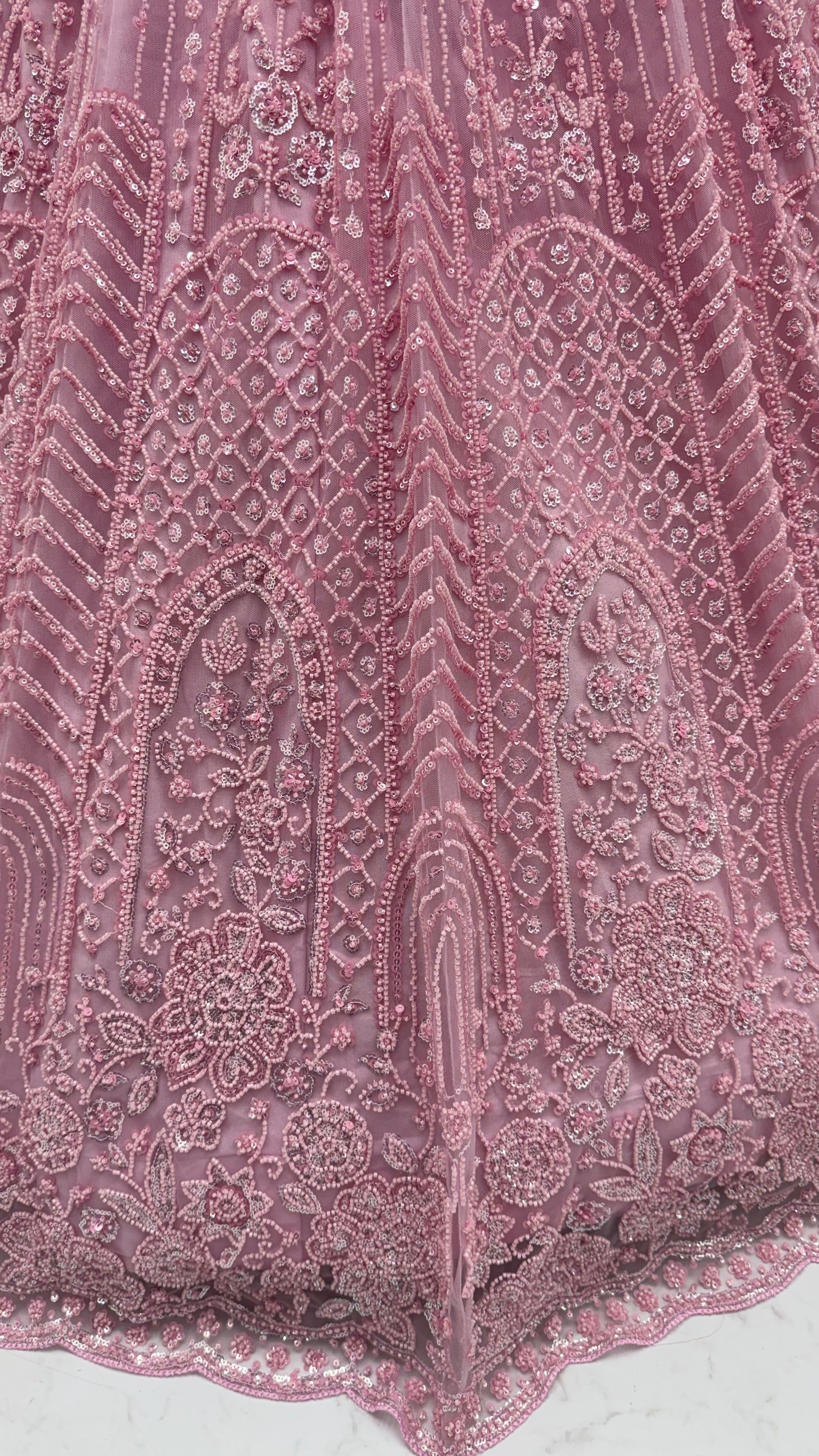 Intricate motifs and Beautiful Patterned Sequence arranged in Partywear Handwork Lehenga Chol