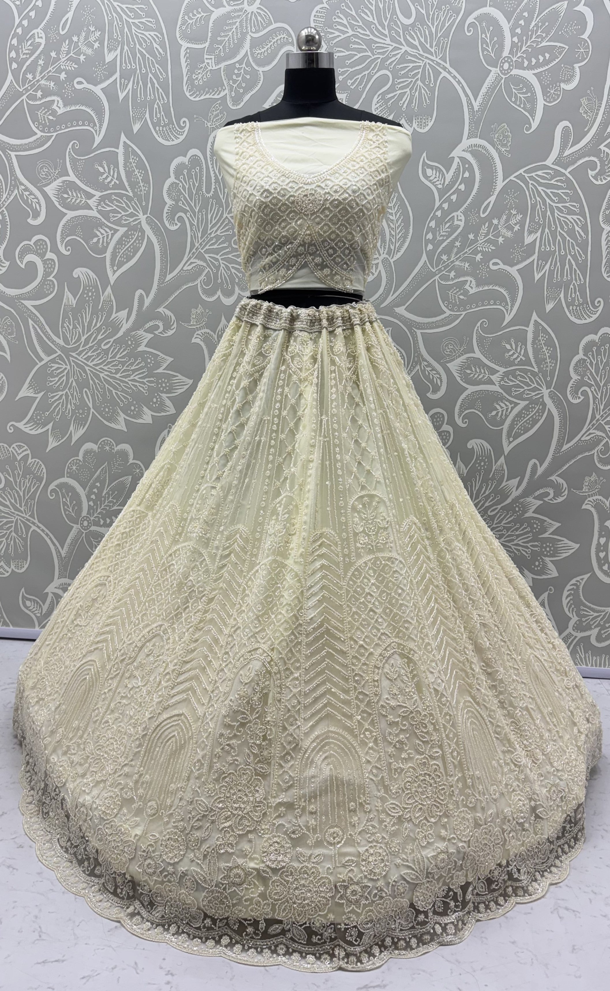 Intricate motifs and Beautiful Patterned Sequence arranged in Partywear Handwork Lehenga Chol