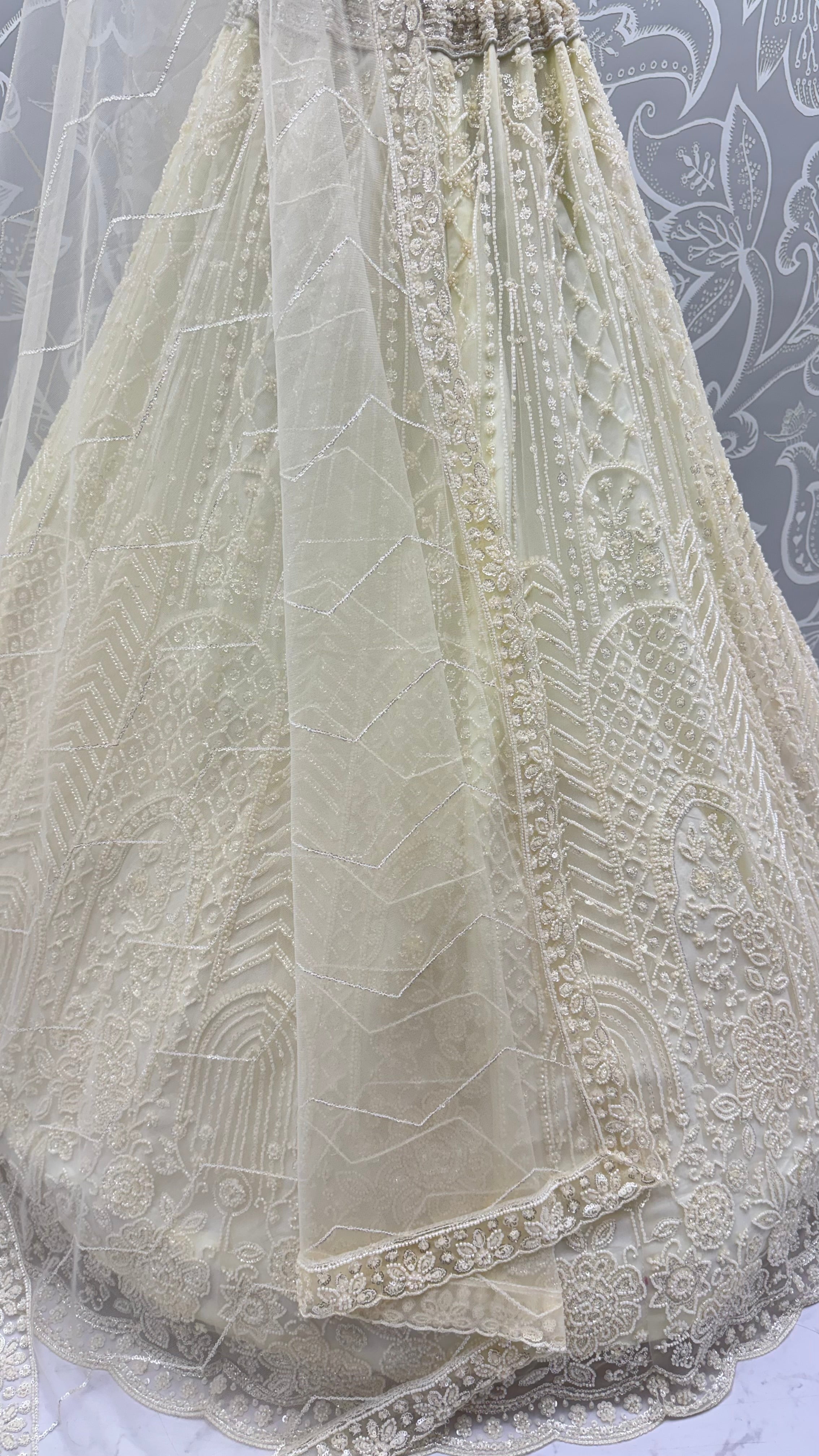 Intricate motifs and Beautiful Patterned Sequence arranged in Partywear Handwork Lehenga Chol