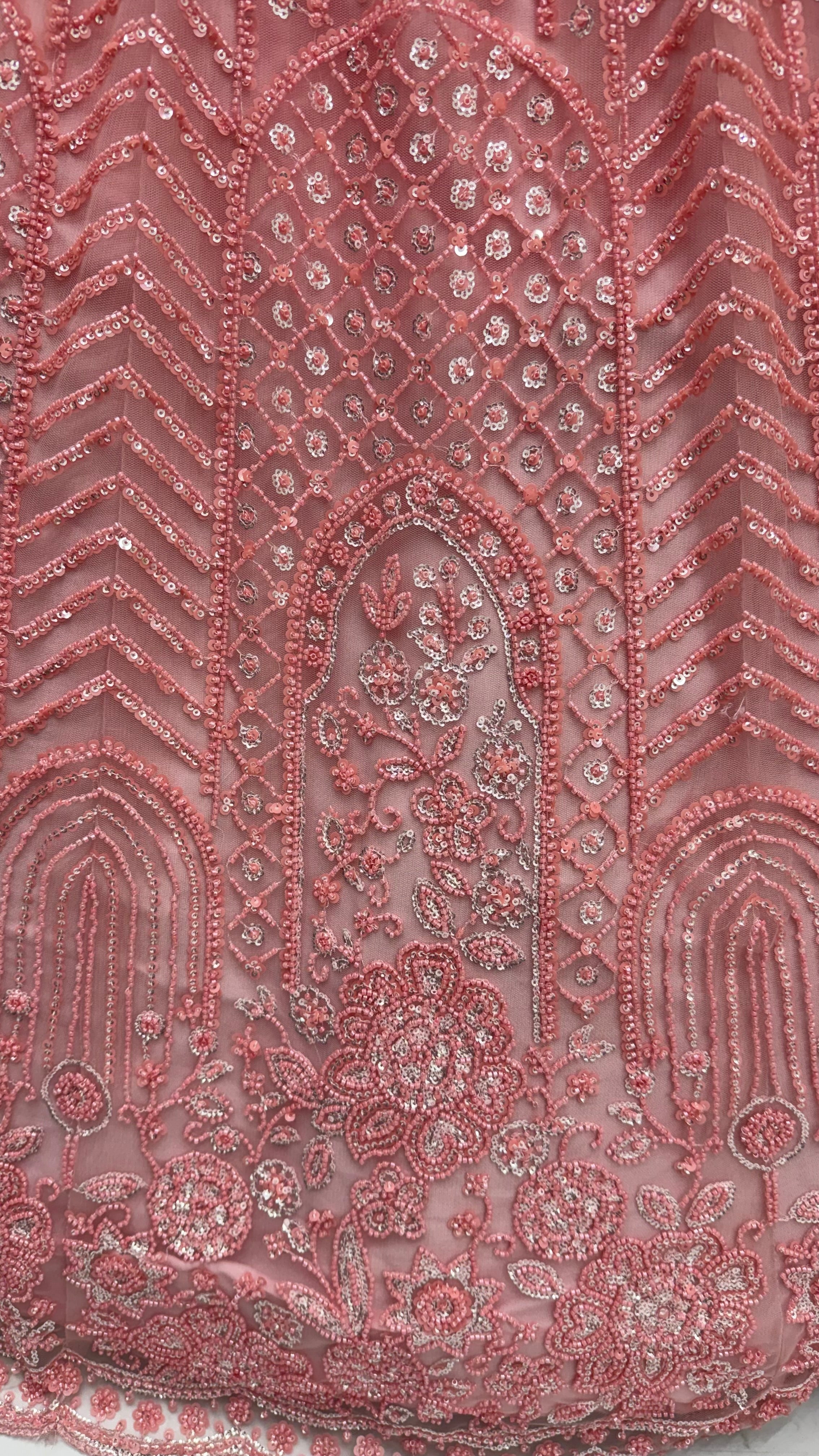 Intricate motifs and Beautiful Patterned Sequence arranged in Partywear Handwork Lehenga Chol