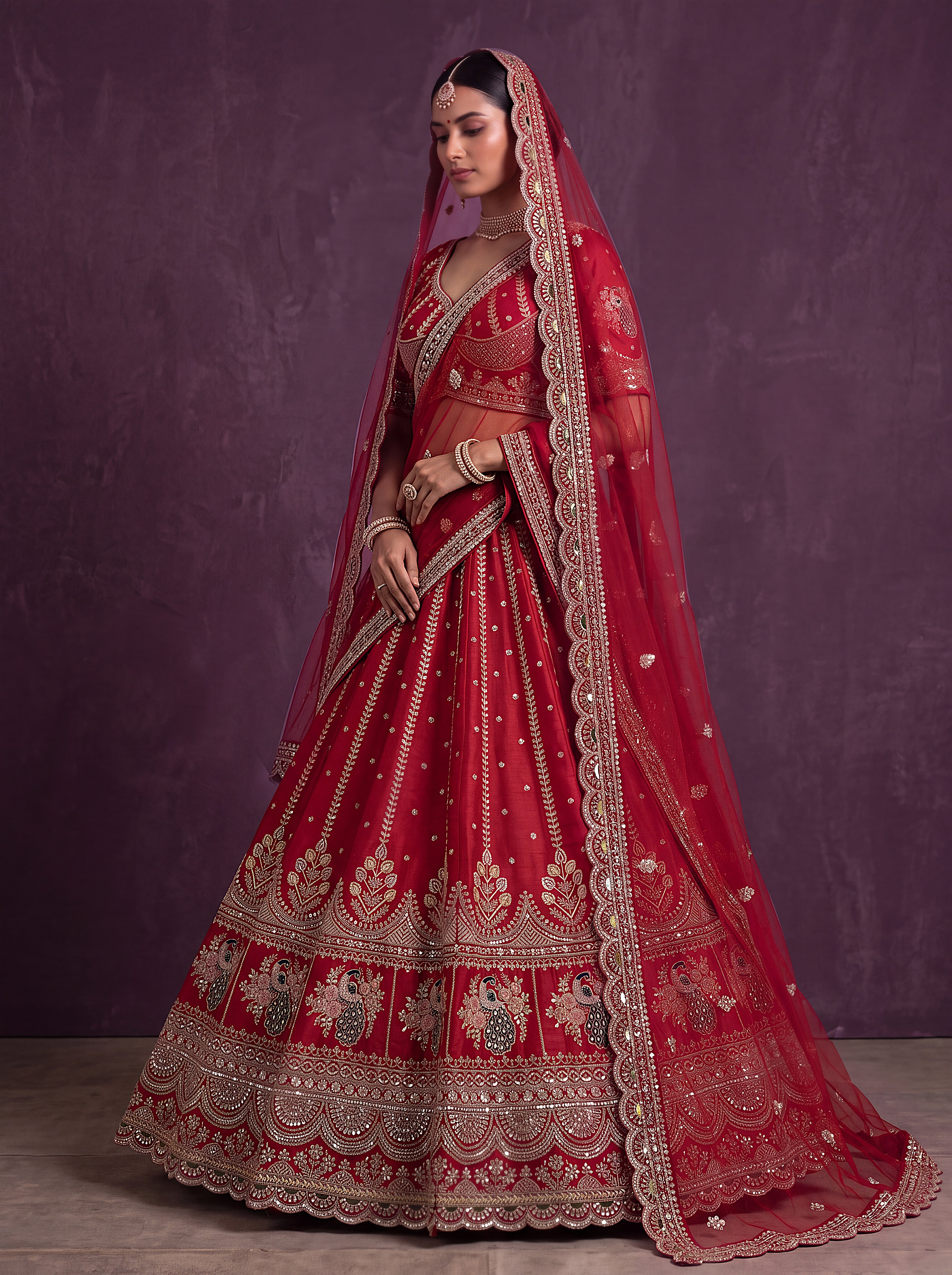 Designer Red Bridal Lehenga Choli with Heavy Embroidery and Embellished Dupatta