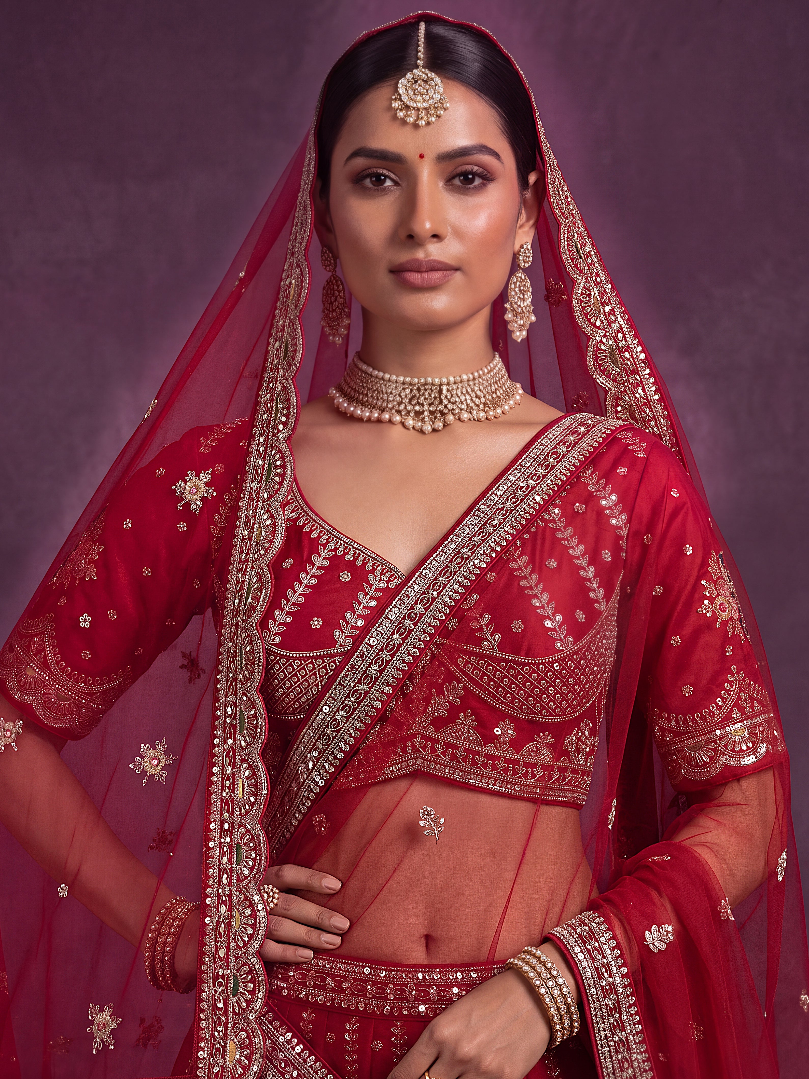 Designer Red Bridal Lehenga Choli with Heavy Embroidery and Embellished Dupatta