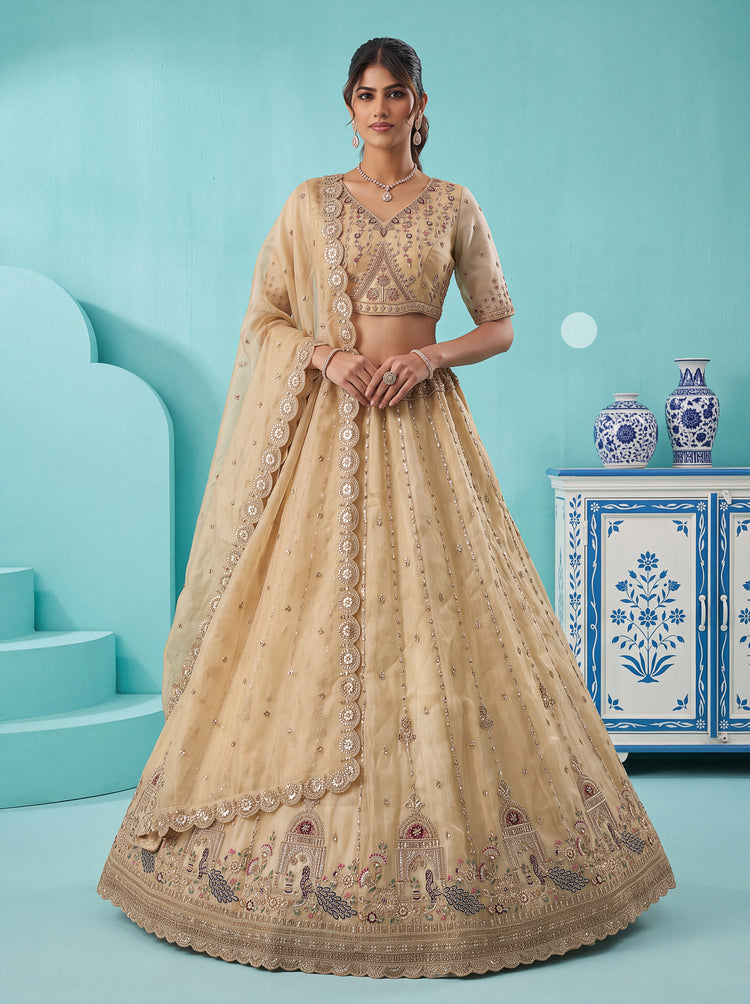 The Mayura Champagne Beige Peacock Lehenga Choli