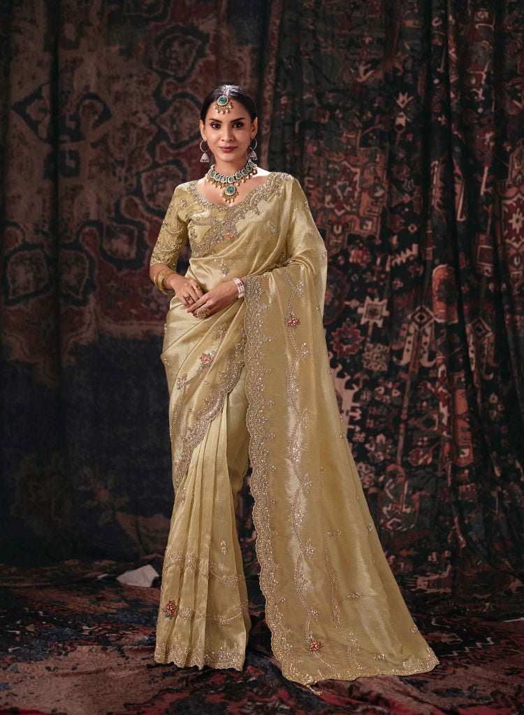 Beige Kanjivaram Silk Saree with Embroidered Vines and Scalloped Border