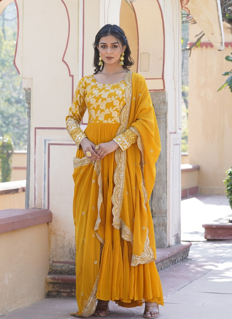 Delightful Wedding Wear Long Gown in Yellow Colour Delightful Wedding Wear Long Gown in Yellow Colour